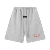 Fear Of God Essentials Red Writing Shorts Grey